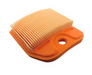 orange pleated paper filter on a white background